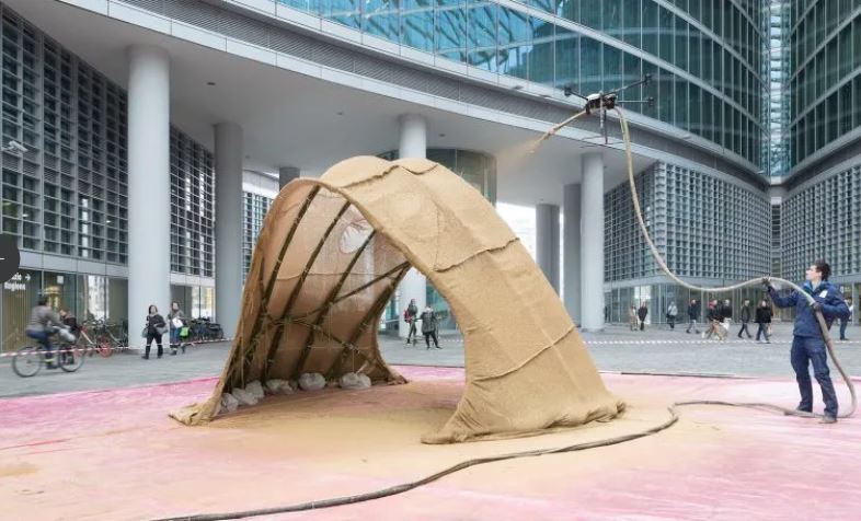 Drones Could Spray Your Next House Out of a Hose
