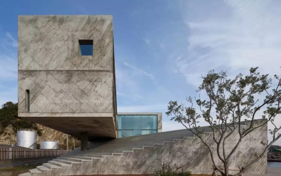 Concrete House Appears to Float Over Its Base