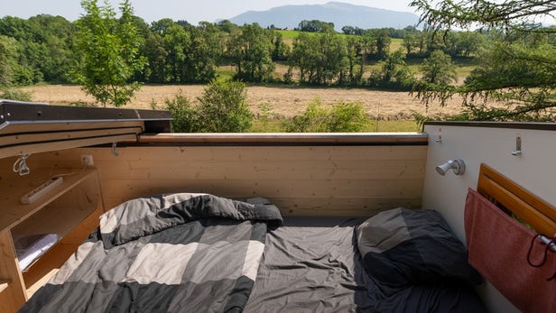 Sliding Roof Opens Tiny House Bedroom to the Sun or Stars