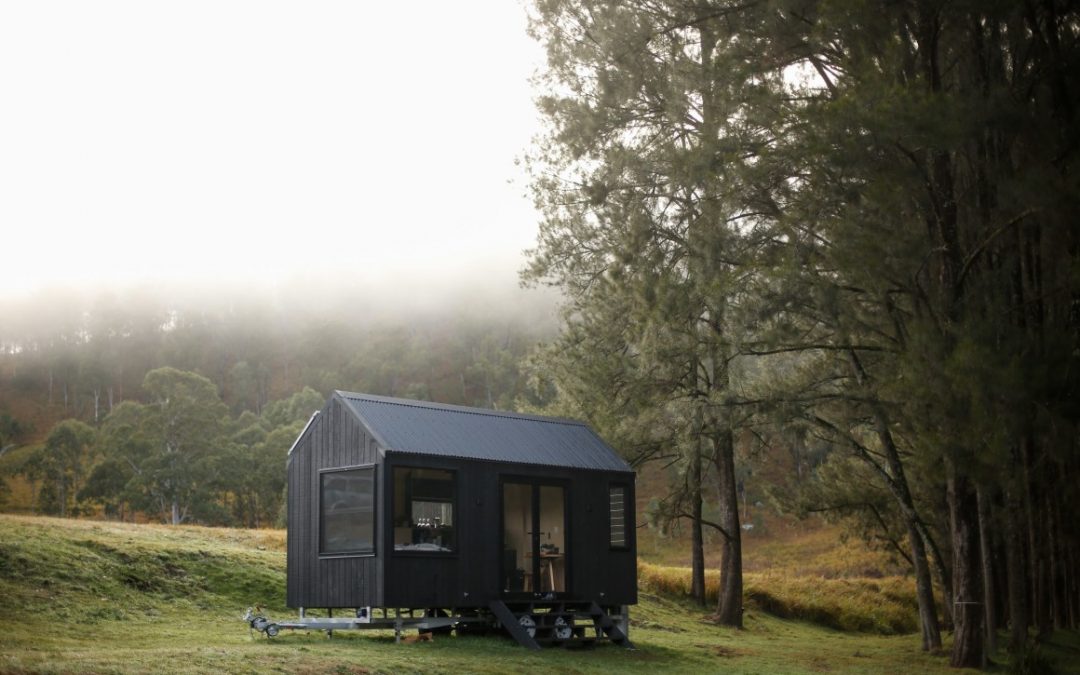 The tiny house runs off-the-grid with a roof-based solar power setup and features a simple but comfortable interior suitable for up to two people.