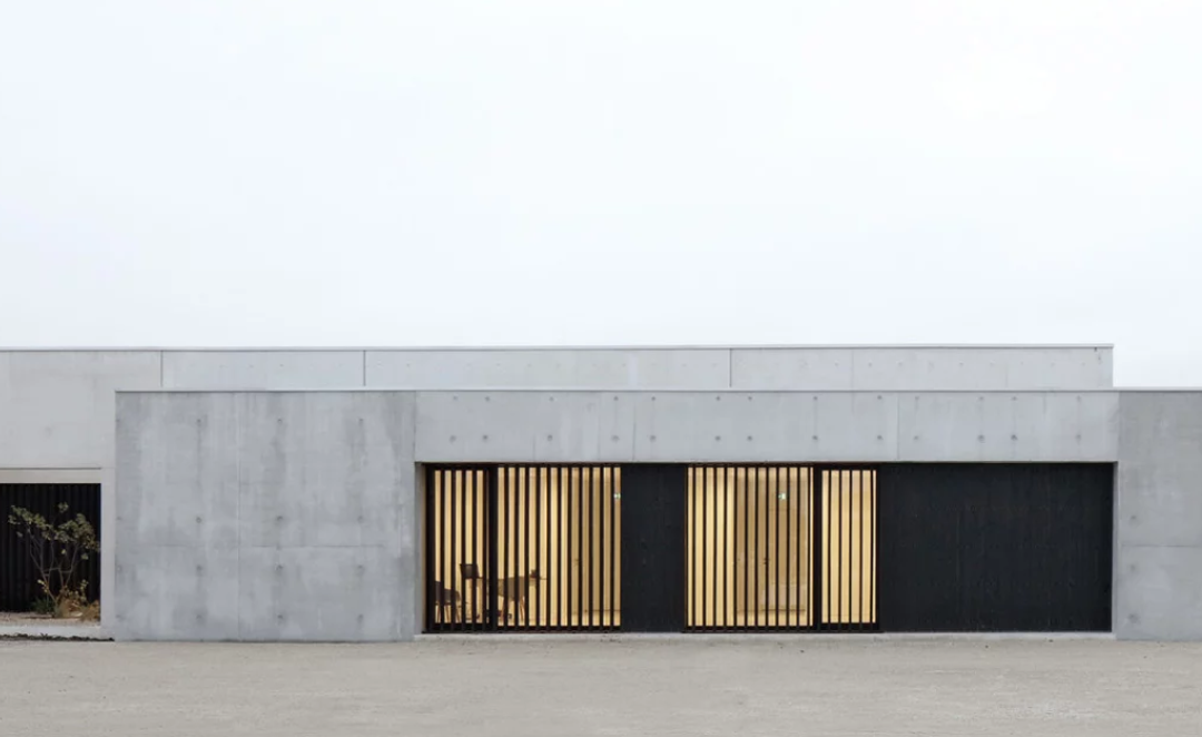 A6A combines White Concrete + Charred Wood for Les Patios Health Center in France