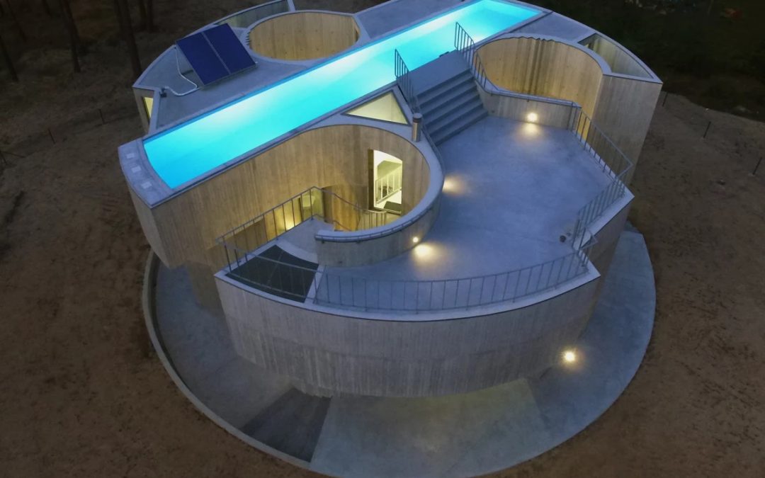Concrete Retreat Puts a Pool in The Moof and Daylight Down Below