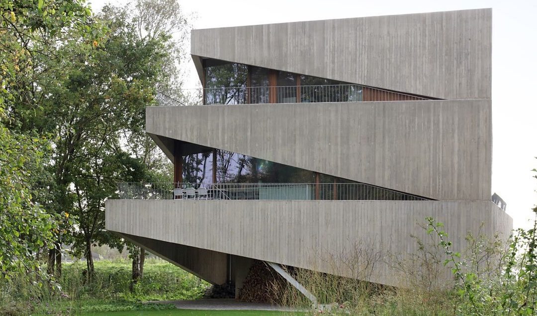 Architects Design Asymmetrical Concrete House