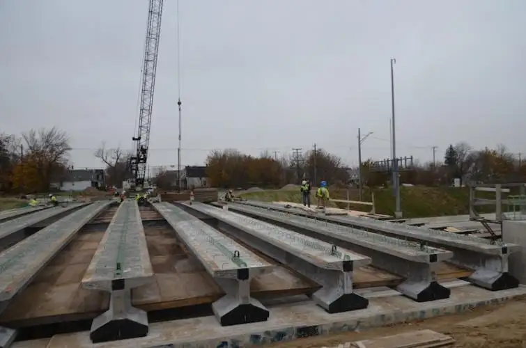 MICHIGAN DOT USING CARBON FIBER TO REINFORCE BRIDGE COMPONENTS ON MAJOR PROJECTS