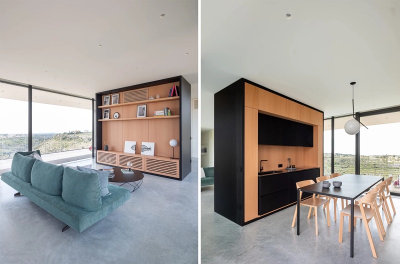 Casa VCS balances on 12 slim pillars, allowing the house to appear as if it is floating above the dramatic rocky landscape