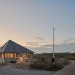 This Prefab, CLT Home Nestles into the Island Dunes