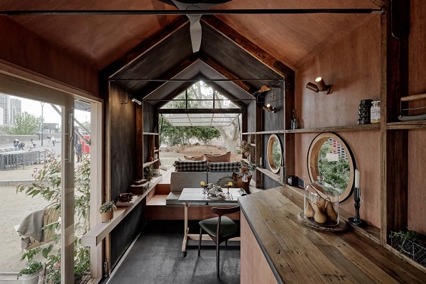 the  best tiny house in 2022 - Stella the Stargazer's interior decor makes use of reclaimed hardwoodBrook James Commissioned by an Australian tourism and events company, Ample's 