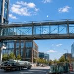 Design for Disassembly: Building for Reuse, Adaptability and a Circular Future Modern modular skybridge designed for disassembly with reusable steel and glass components supporting sustainable construction practices.